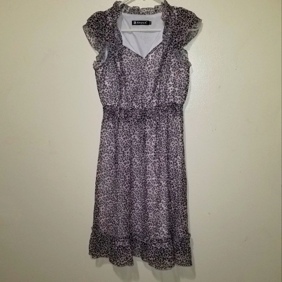 A Cheetah print dress - Picture 1 of 4